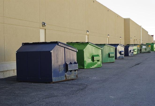 large construction waste containers in a row at a job site in Ashland